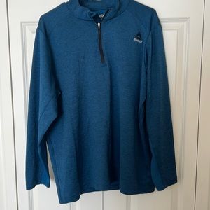 Reebok Long Sleeve 1/4 Zip in Heathered Blue.